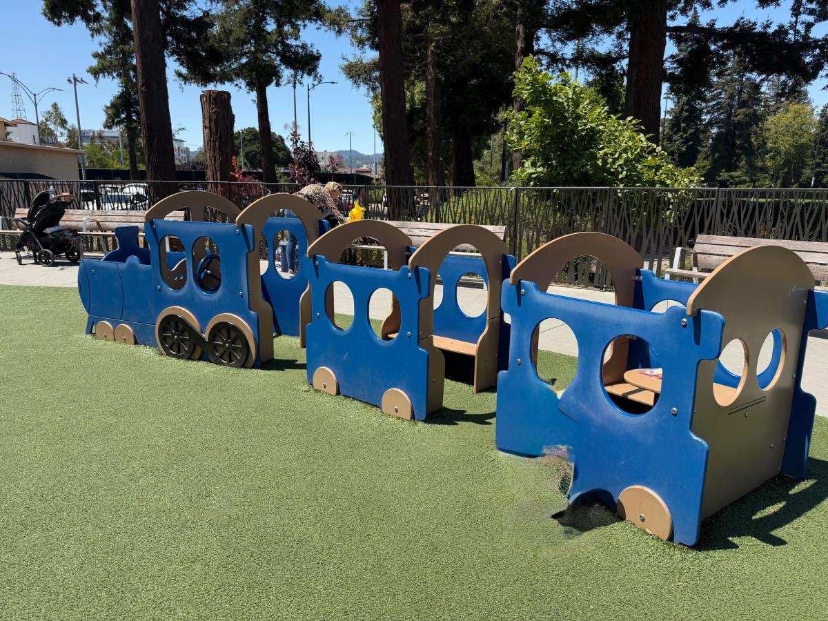 Free playground with a replica train to climb aboard