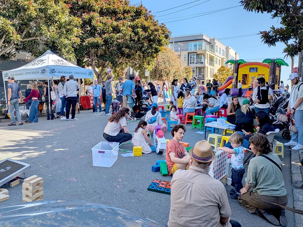 Neighborhood block party with pancakes and grilled cheese